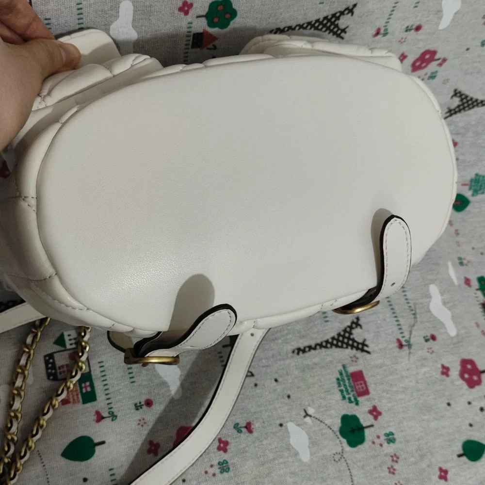 Coach Quilted Chalk Leather Drawstring Backpack with Gold Hardware